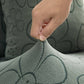 Housse polaire verte avec motif floral sur coussin de canapé