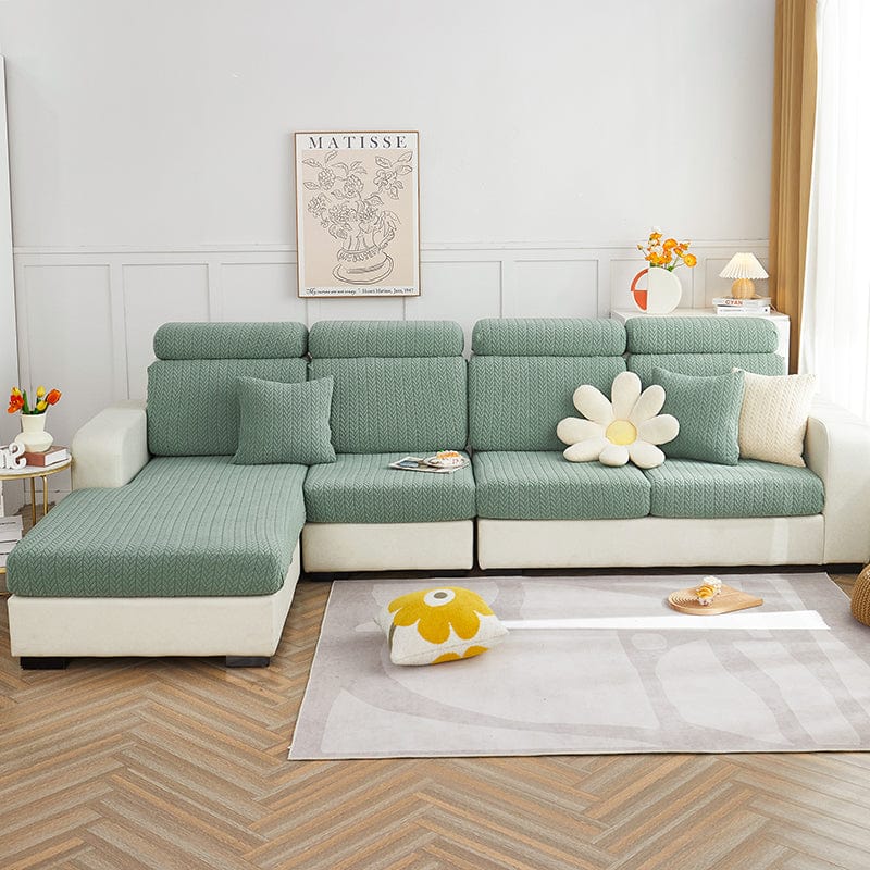 Coussin de canapé avec housse polaire verte, motif visible