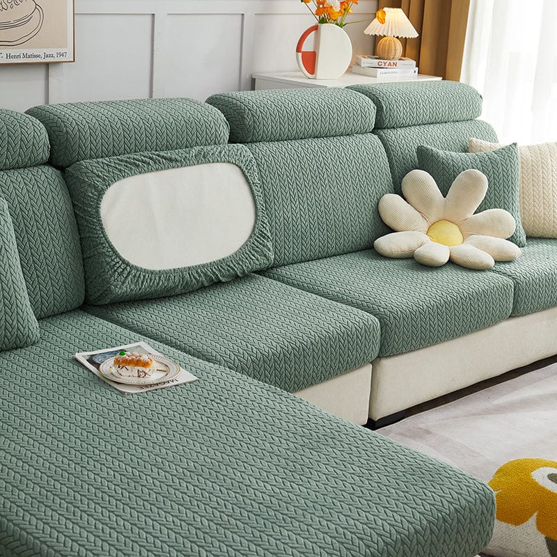 Vue latérale d'un coussin recouvert de housse polaire verte