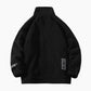 Veste noire en bouclette pour femme sur cintre