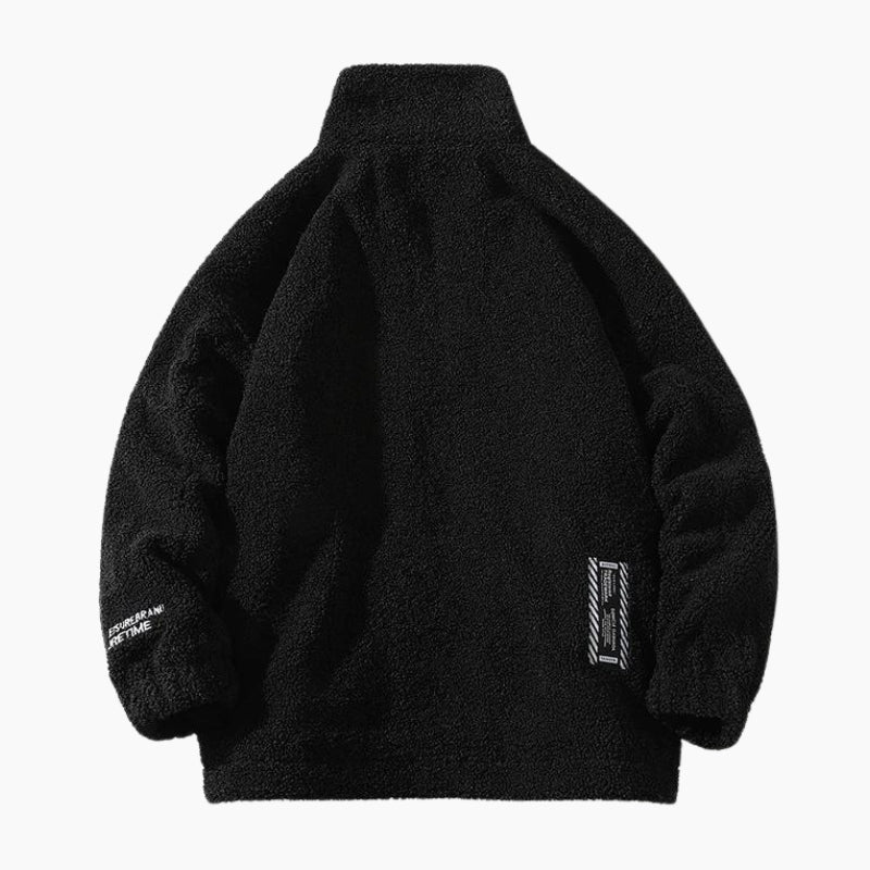 Veste noire en bouclette pour femme sur cintre