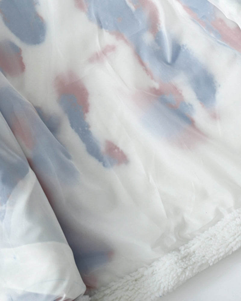 Vue arrière de la veste tricolore en duvet épais