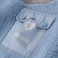 Veste flanelle tricolore portée en extérieur