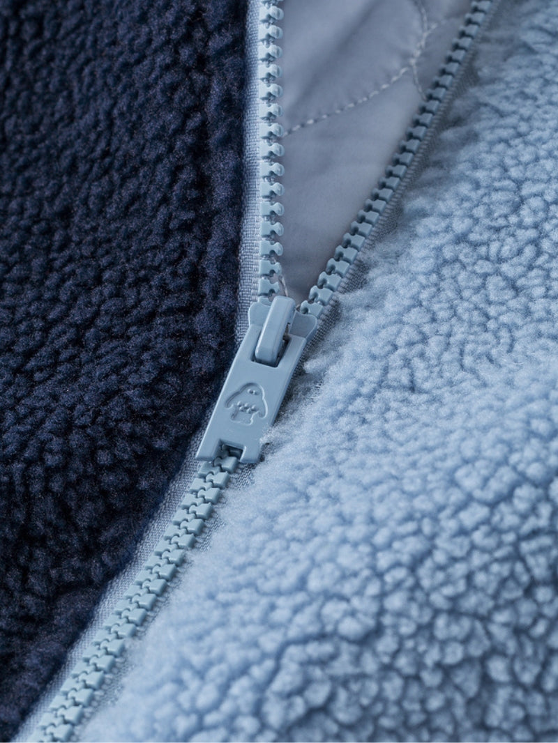 Zoom sur la texture flanelle de la veste