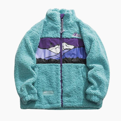 Vue de face d'une veste turquoise ample et chaude