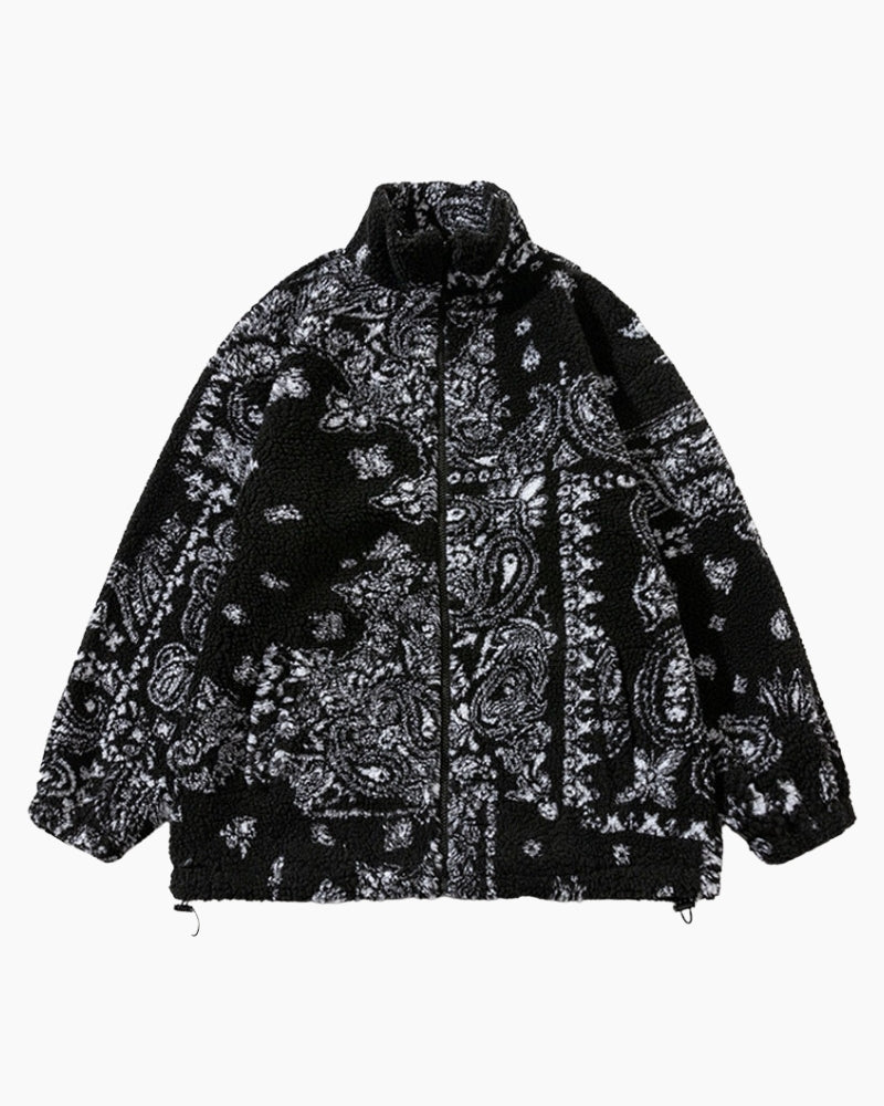 Vue arrière d'une veste en peluche crème avec motifs distinctifs