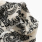 Veste noire en peluche avec poches et col légèrement montant