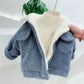 Veste bleue pour enfant avec col rabattu et poches