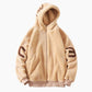 Veste polaire beige, capuche et poches visibles