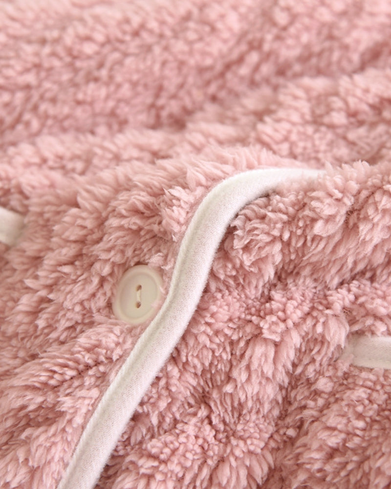 Veste de pyjama avec deux poches avant visibles