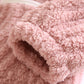 Vue de profil de la veste de pyjama rose