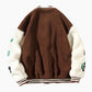 Veste rétro marron et blanche avec écussons brodés