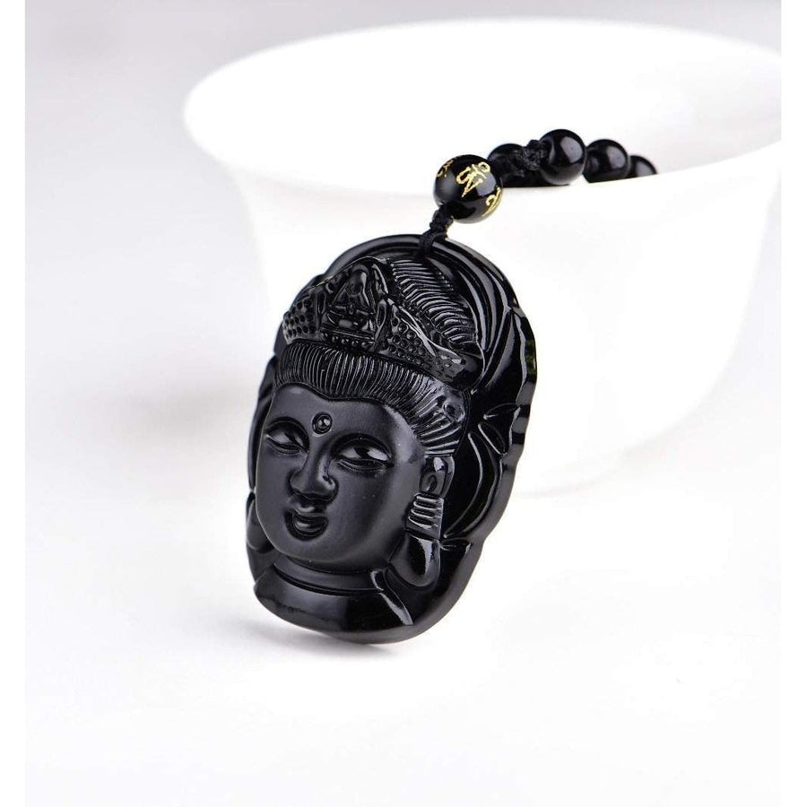 Pendentif Bouddha sculpté en obsidienne noire, vue de face
